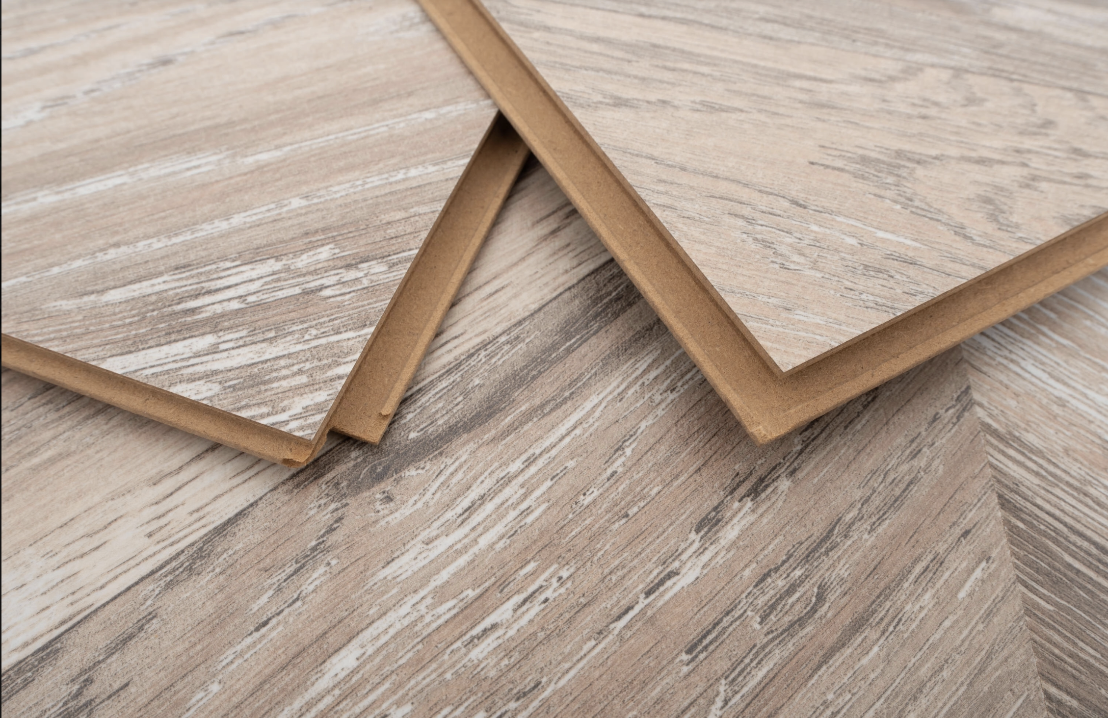 Beige & Brown Oak 8mm Chevron Laminate Floor | 1.8m² Pack Coverage