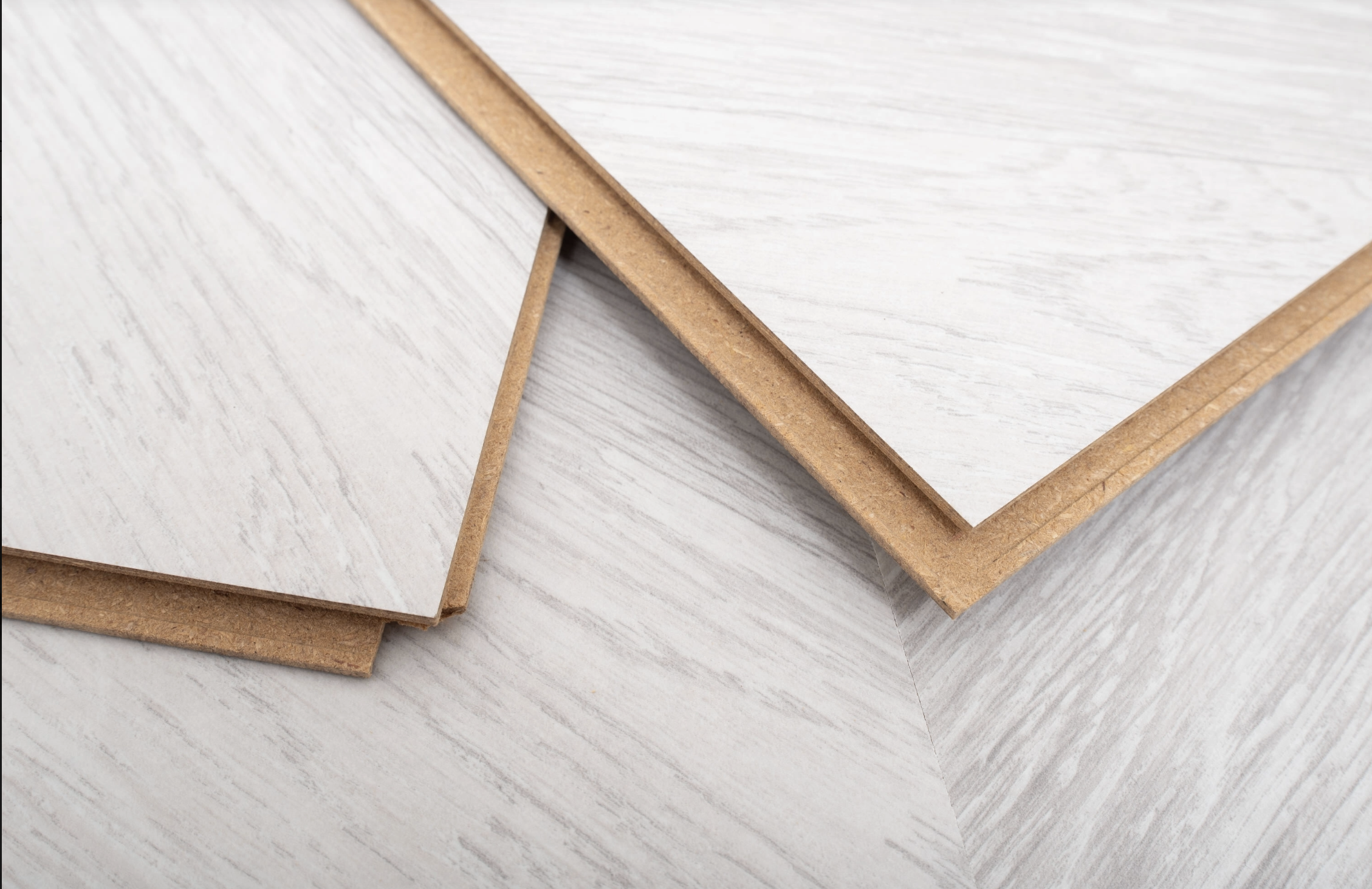 White Grey Oak 8mm Chevron Laminate Floor | 1.8m² Pack Coverage