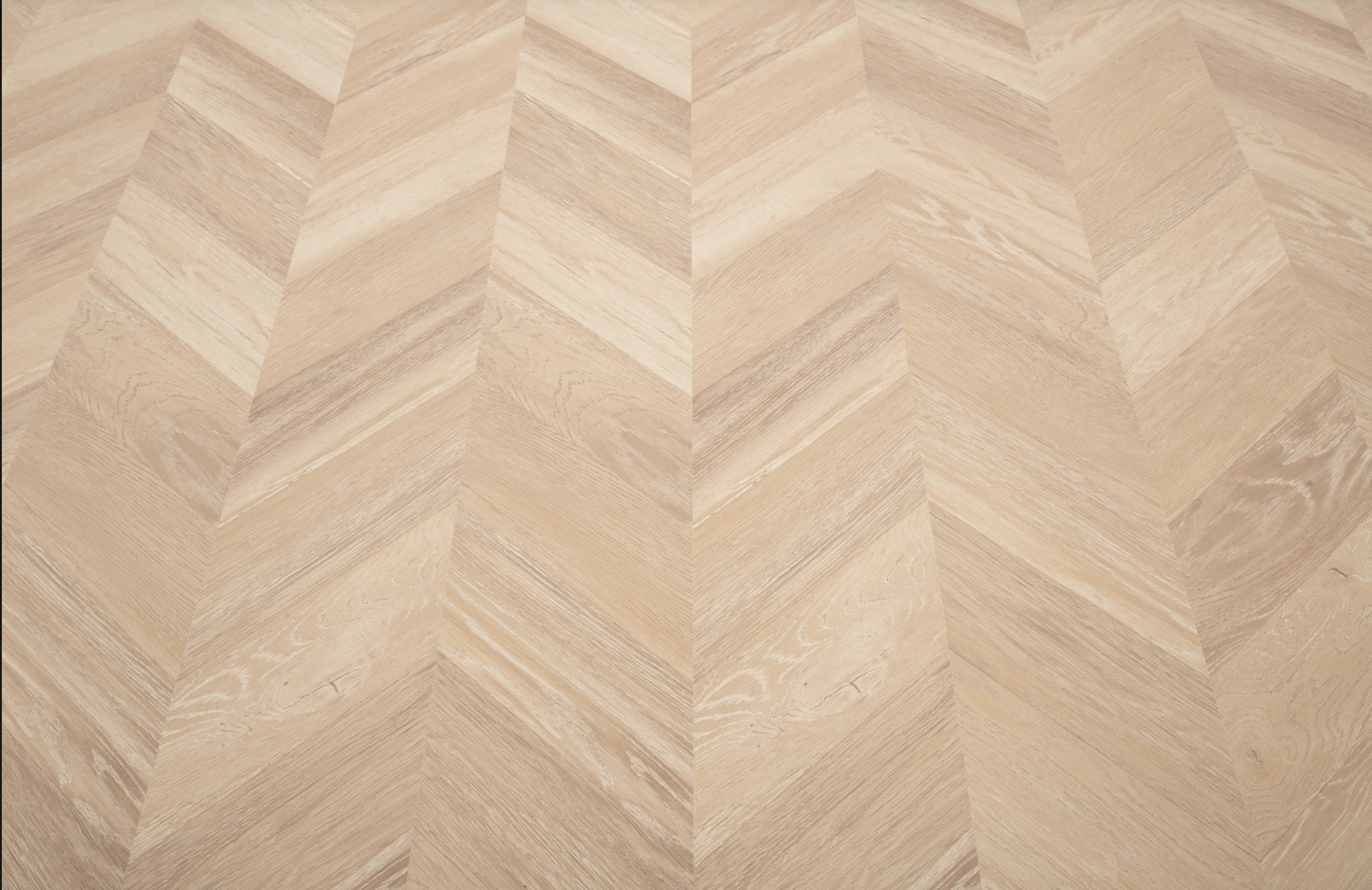 Light Brown Oak 8mm Chevron Laminate Floor | 1.8m² Pack Coverage